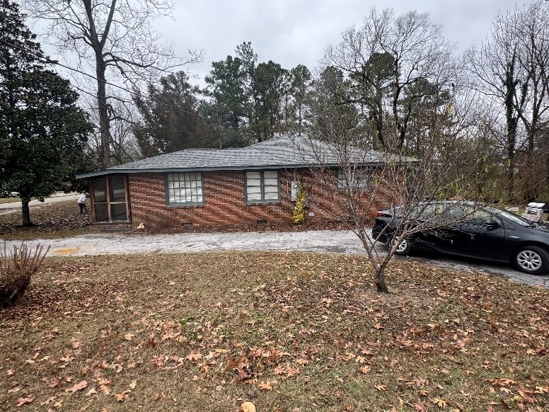 Brick ranch-style home we bought for cash in Clanton, Alabama